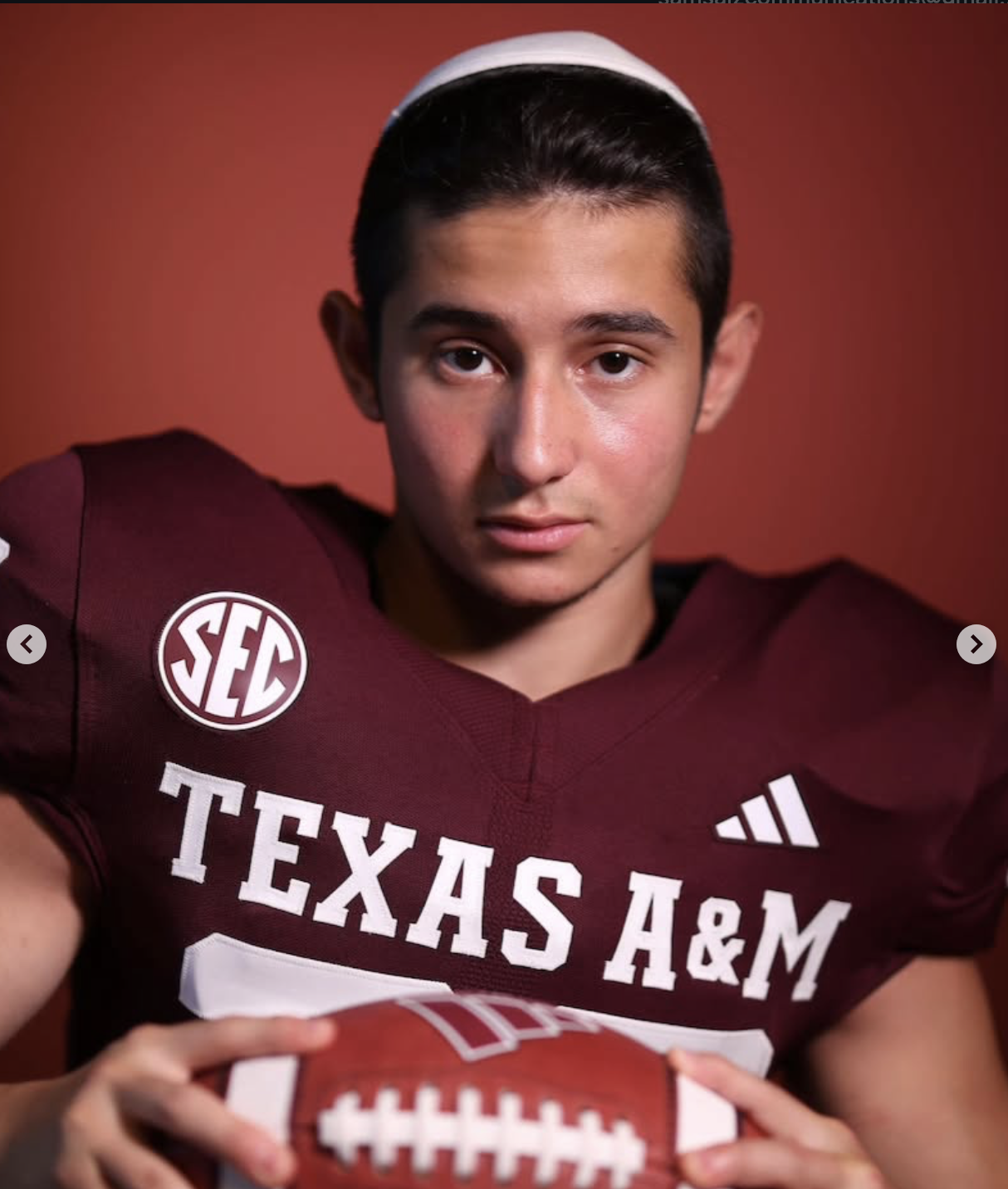 Portrait of a college football player wearing a maroon jersey.